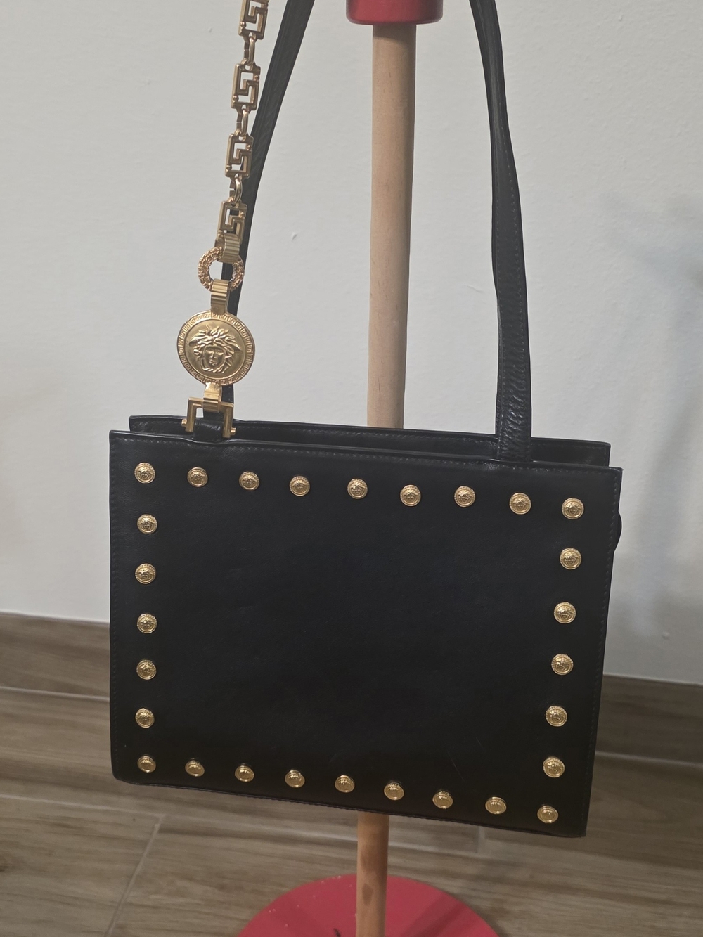Black Leathe Vintage Gianni Versace Studded Shoulder Bag with Gold Medusa Head.